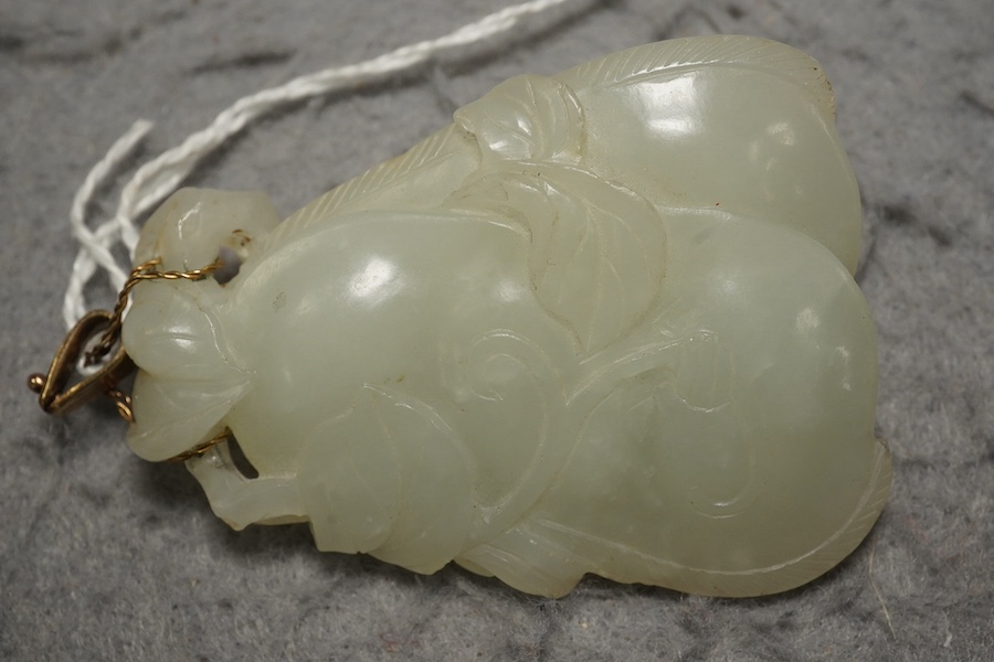 A Chinese pale celadon jade twin gourd pendant, 18th century